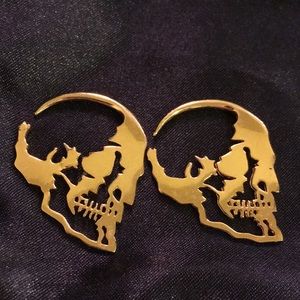 Gold skeleton earring